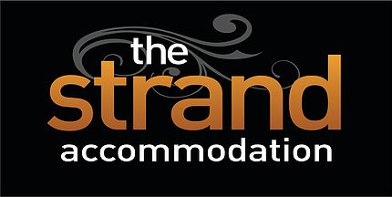 the strand motel logo